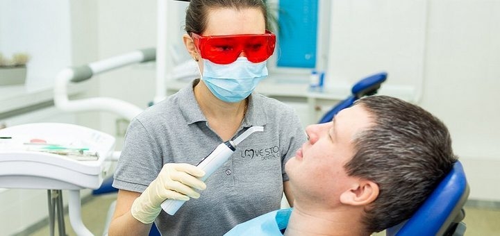 Professional teeth cleaning in lovestom dentistry in kharkov. sign up for a promotion.