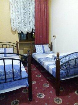 Двухместный номер с односпальными кроватями в гостинице «Централ Парк» во Львове. Бронируйте номер по акции.