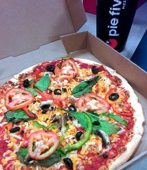 Delicious pizza from the pizzeria "Home pizzeria" in Kiev. Order by promotion