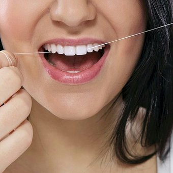 How to floss your teeth?